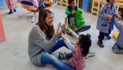 Volunteer Abroad playing in the Nursery